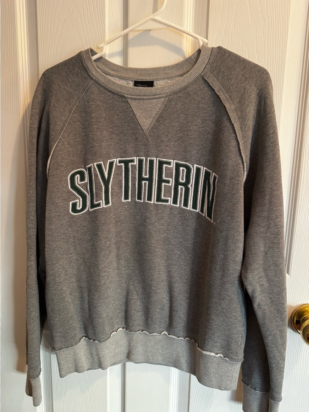 Universal Gray Crewneck Sweatshirt with Dark Green Lettering